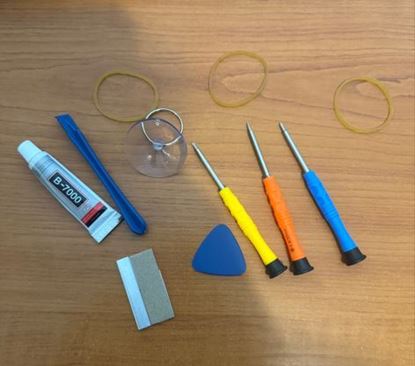 Снимка на Инструмент за ремонт на мобилни телефони, съдържащ лепило B7000